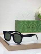 Gucci translucent navy sunglasses with dark tinted lenses and square frames