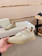 Cream leather sneakers with lace-up closure and embroidered horse logo on side