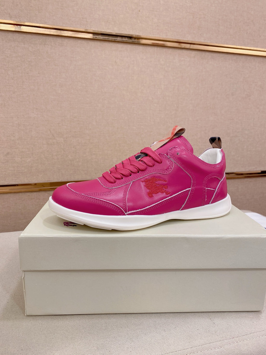 Burberry pink low-top sneakers, lace-up with side logo patch and white sole
