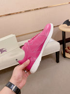 Burberry pink low-top sneakers, hand-held profile with laces and logo