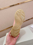 Sneaker outsole view with tread pattern and light gum rubber base