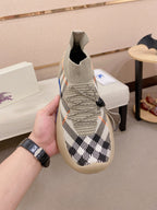 Knit slip-on sneaker with beige and black check upper, lace detail, blue sole
