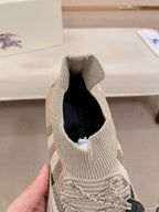 Knit sneaker interior opening with laces, beige upper with check accents