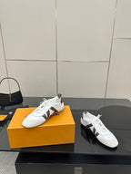 Louis Vuitton white lace-up sneakers with brown monogram detail and sturdy sole