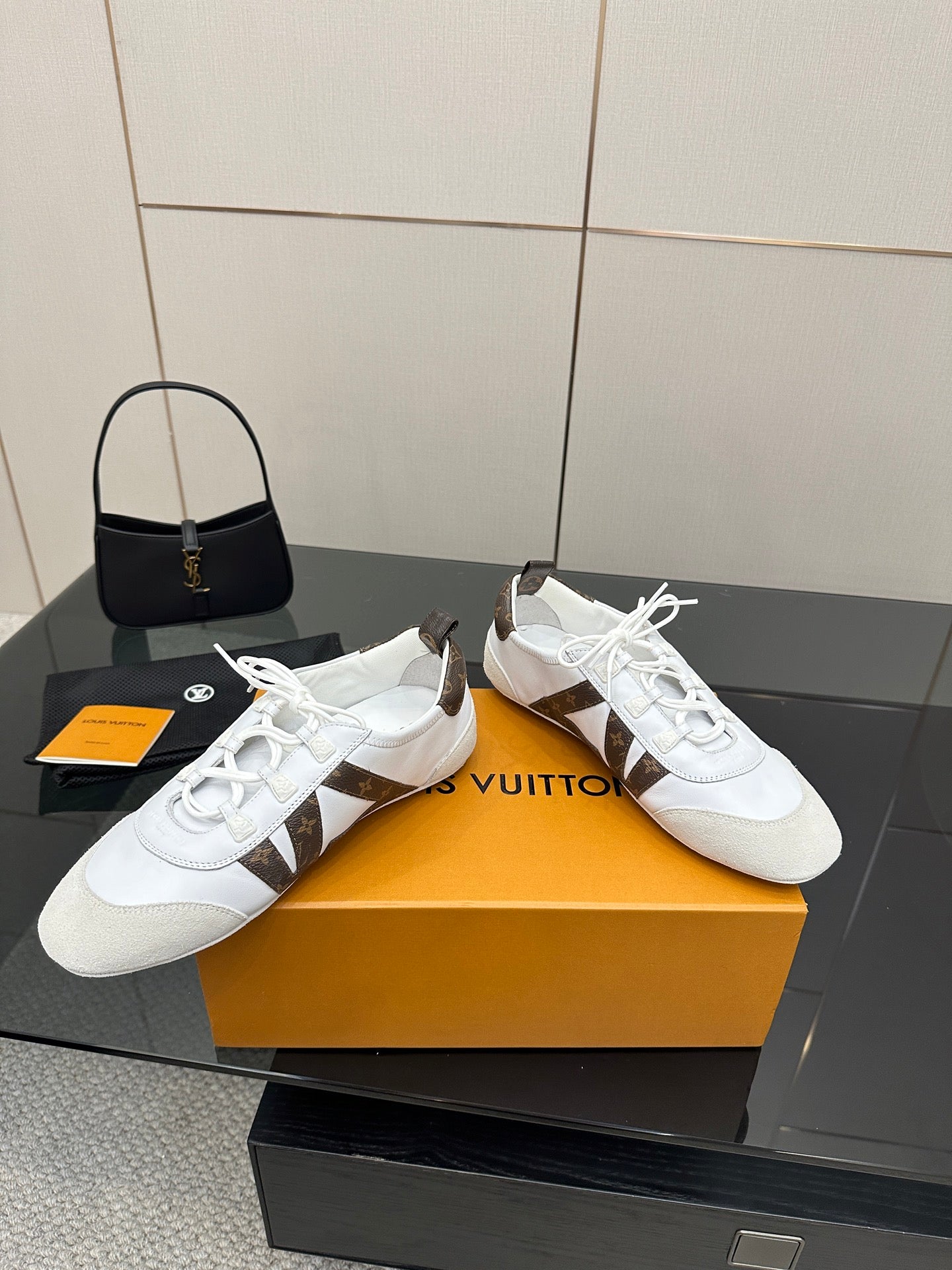 Louis Vuitton white lace-up sneakers with brown monogram heel and side panels