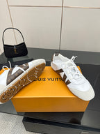 Louis Vuitton white sneakers with brown monogram panels and patterned rubber outsole