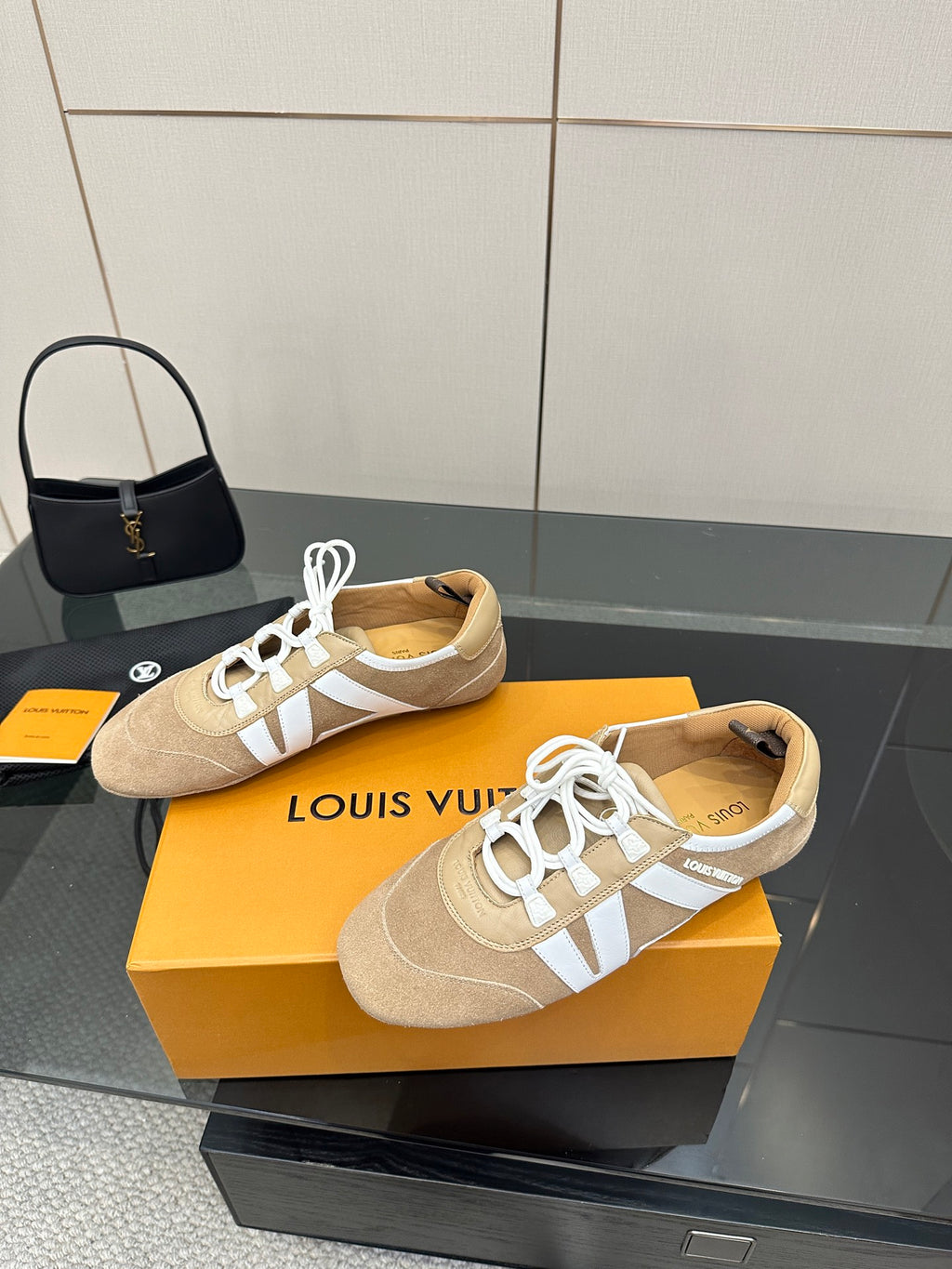 Louis Vuitton women’s lace-up sneakers in beige with white straps and round toe