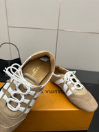 Louis Vuitton women’s beige sneakers, open view showing interior lining and lace-up top