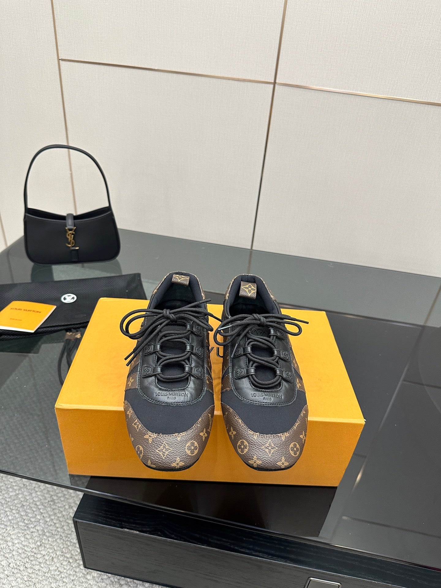 Louis Vuitton lace-up sneakers, dark monogram canvas with black leather trim