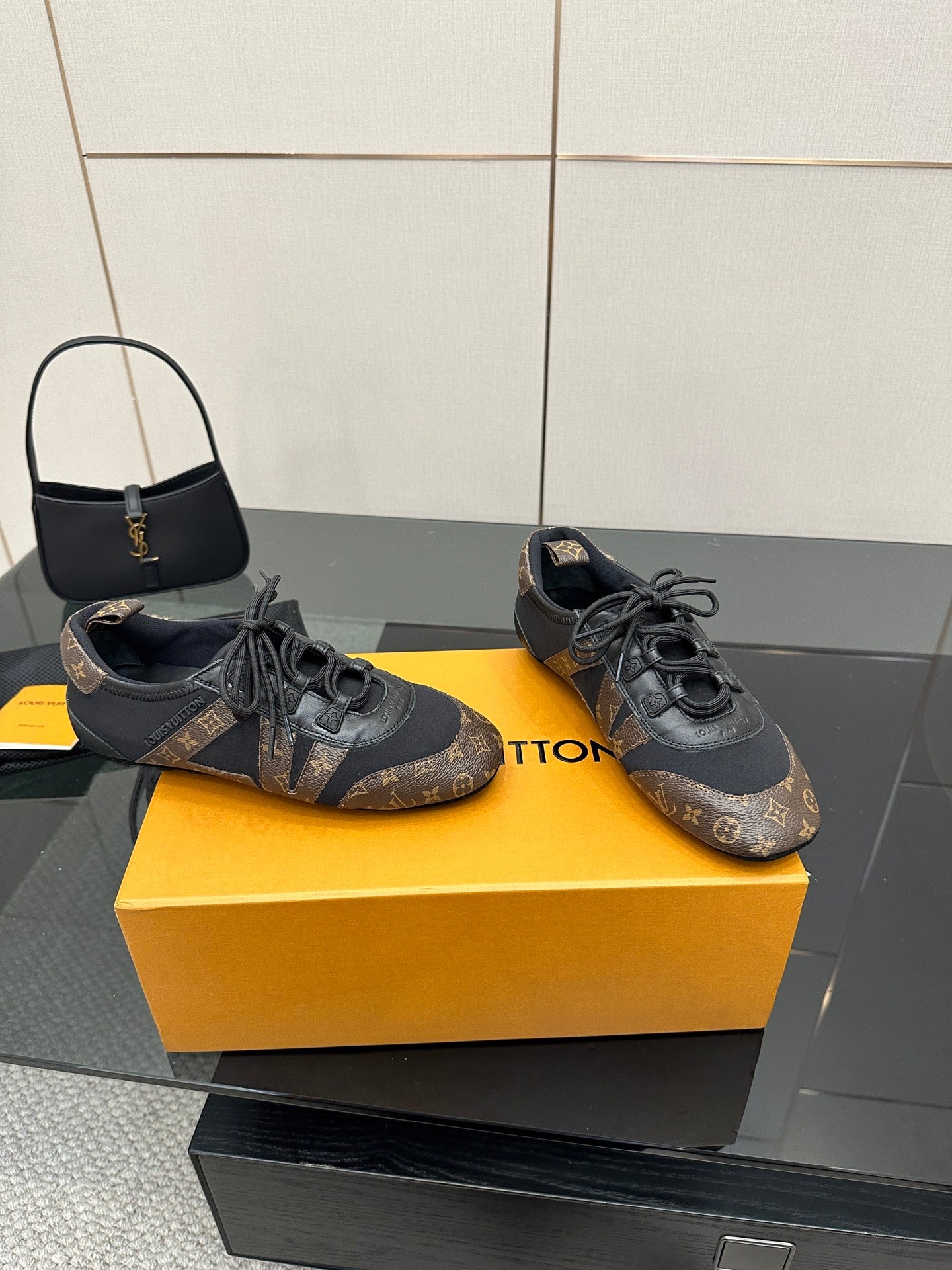 Louis Vuitton lace-up sneakers, monogram canvas and dark gray leather lining