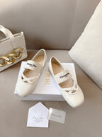 Ladies Dior ballet flats in light cream with elastic strap and textured toe panel
