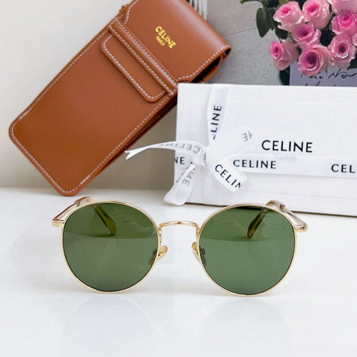 Round gold-framed sunglasses with green tinted lenses and slim bridge
