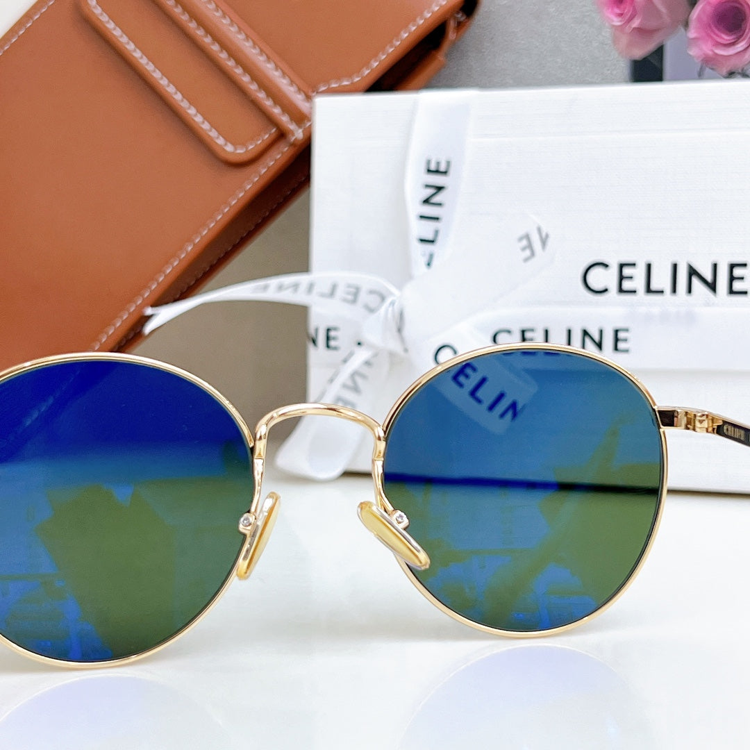 Celine round sunglasses with gold frame and blue mirrored lenses