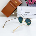 Gold sunglasses with round blue tinted lenses and slim metal arms