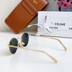 Celine round sunglasses with gold frame and dark tinted lenses