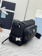 Prada small backpack-style bag, black exterior with flap and metal logo plaque