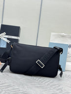 Prada crossbody bag, black front flap with square buckle and logo strap detail