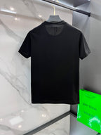 Black Versace logo T-shirt on hanger, back view