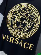 Versace black T-shirt with large gold Medusa emblem and VERSACE text