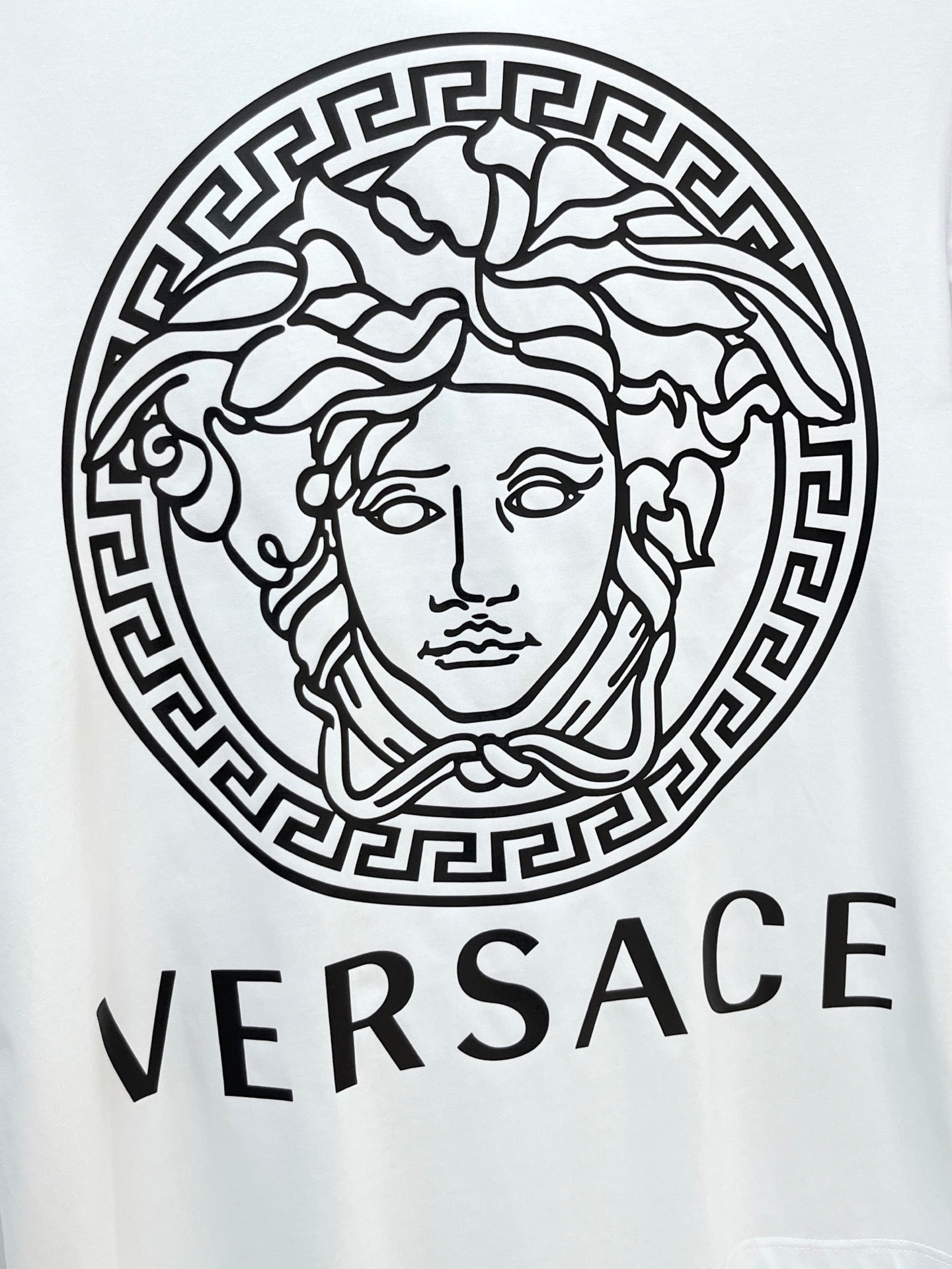 White Versace T-shirt with large Medusa emblem and VERSACE word