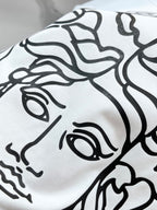 White Versace T-shirt with black baroque-style graphic pattern