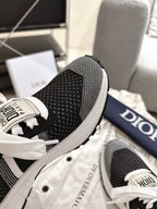 Unisex Dior sneaker heel, black mesh fabric with white midsole edge
