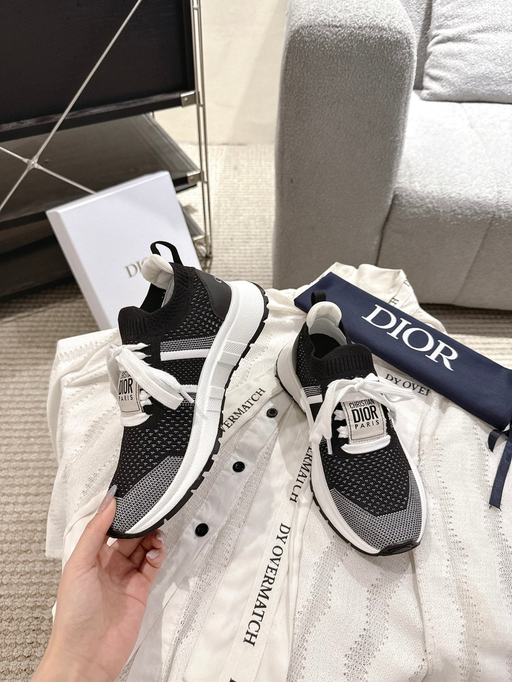 Unisex Dior sneakers, knit black upper with white stripe and lace-up