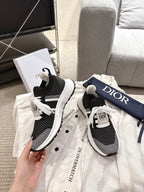 Unisex Dior sneakers, knit black upper with white stripe and lace-up