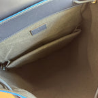 Gucci backpack interior zip pocket and beige lining with small label patch.