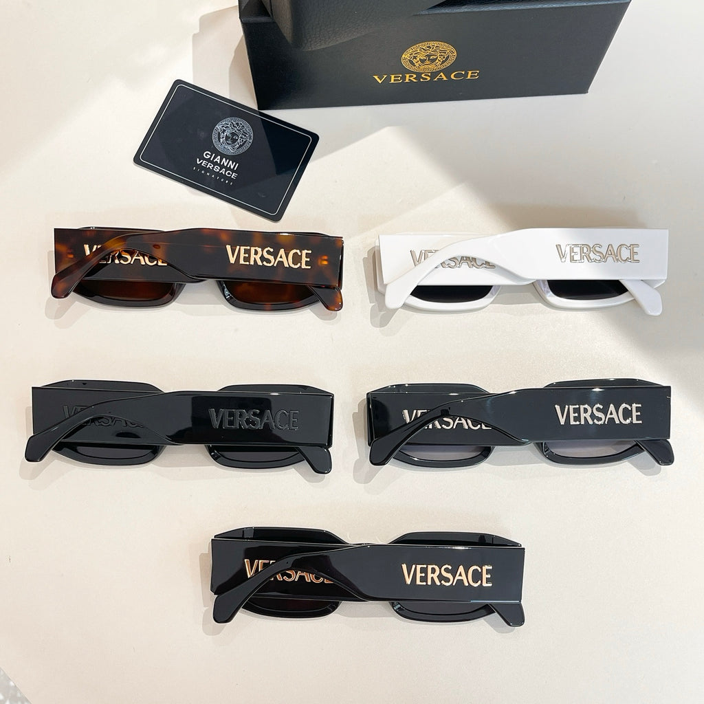 Assorted VERSACE glasses set with black, tortoiseshell, and white frames