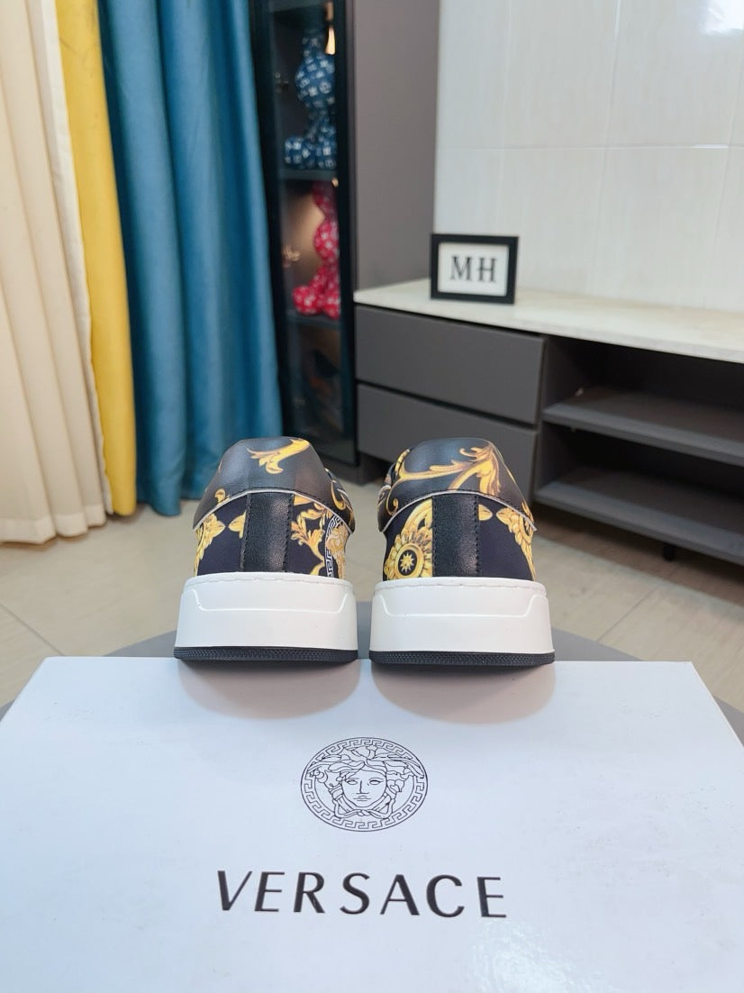 Versace sneakers back view, dark heels with gold baroque print and white soles