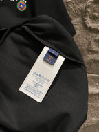 Black T-shirt fabric with inside neck label tag