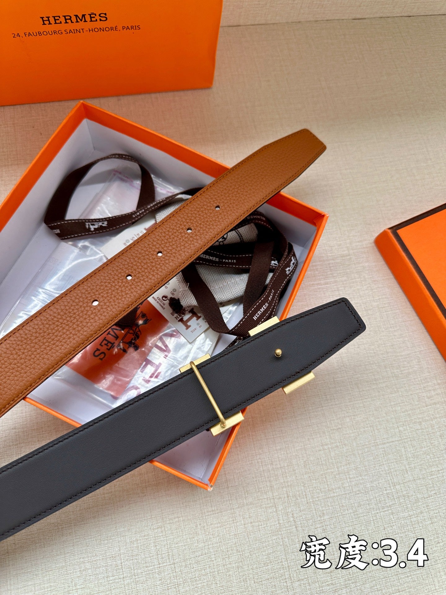 Leather belt set: brown and dark leather straps with silver-tone rectangular buckle details.