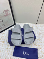 Dior slide sandals, light gray suede with two wide straps and buckle fastening