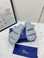 Dior slide sandals in light gray suede with two straps and adjustable buckle detail