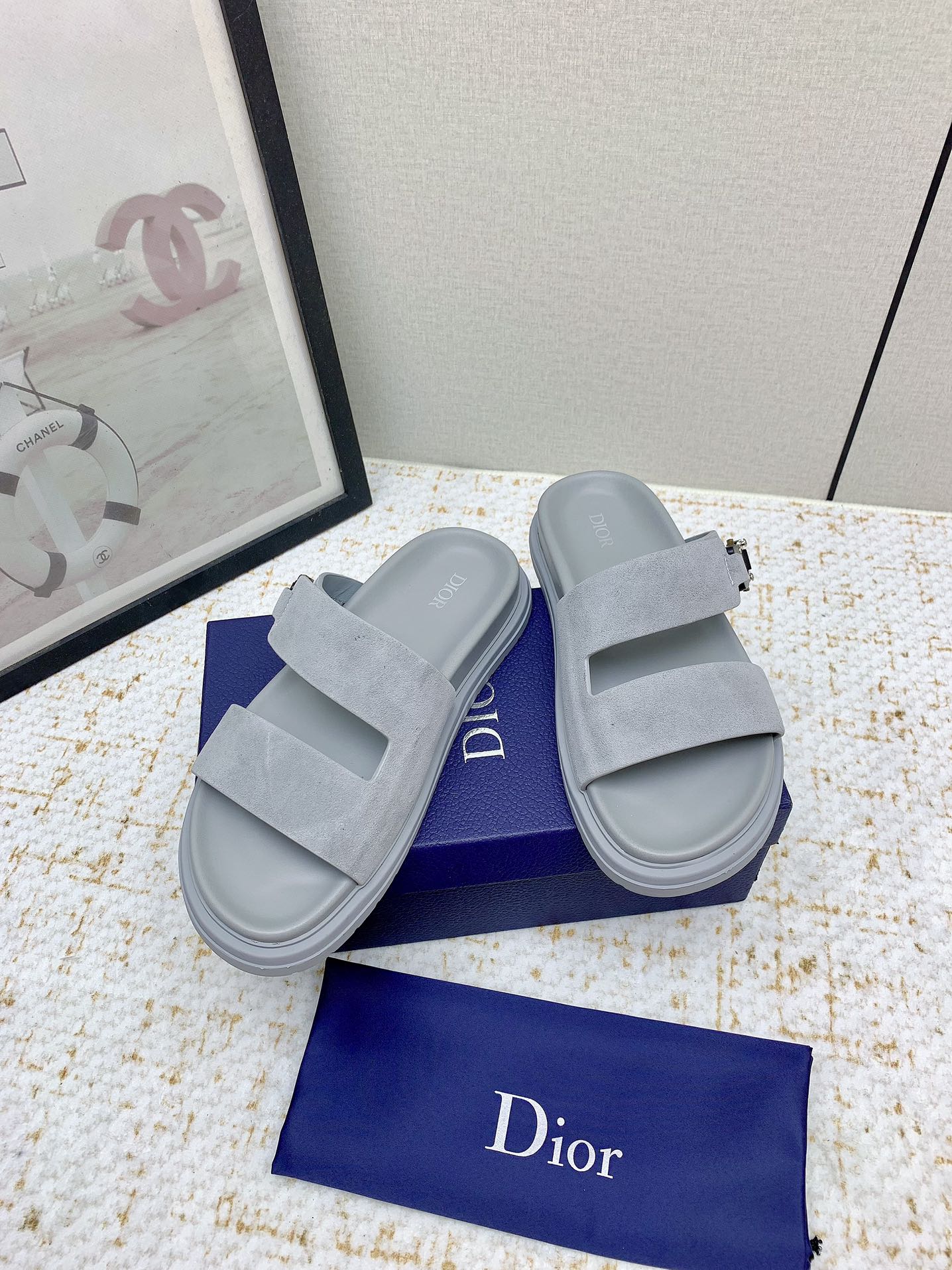 Dior slide sandals in light gray suede with two straps and adjustable buckle detail