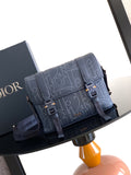 Dior blue embossed monogram crossbody bag with flap, double straps, and gold-tone hardware
