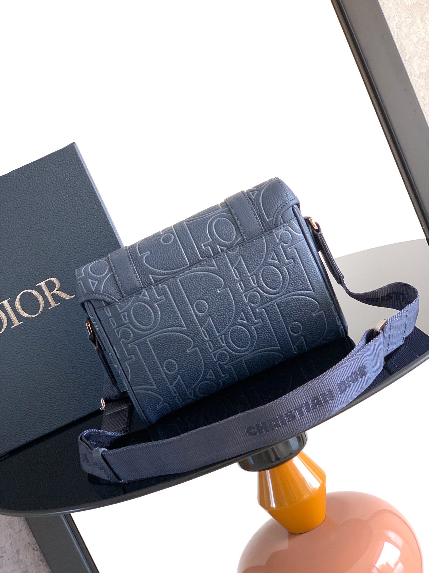Dior blue embossed monogram flap bag with detachable shoulder strap and buckle details