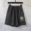 Balenciaga dark shorts with elastic waistband and front pleats