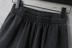 Balenciaga dark shorts with elastic waistband and gathered pleat detail