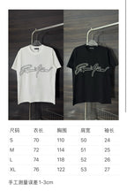 White and black crewneck T-shirts with rhinestone script logo and size chart.