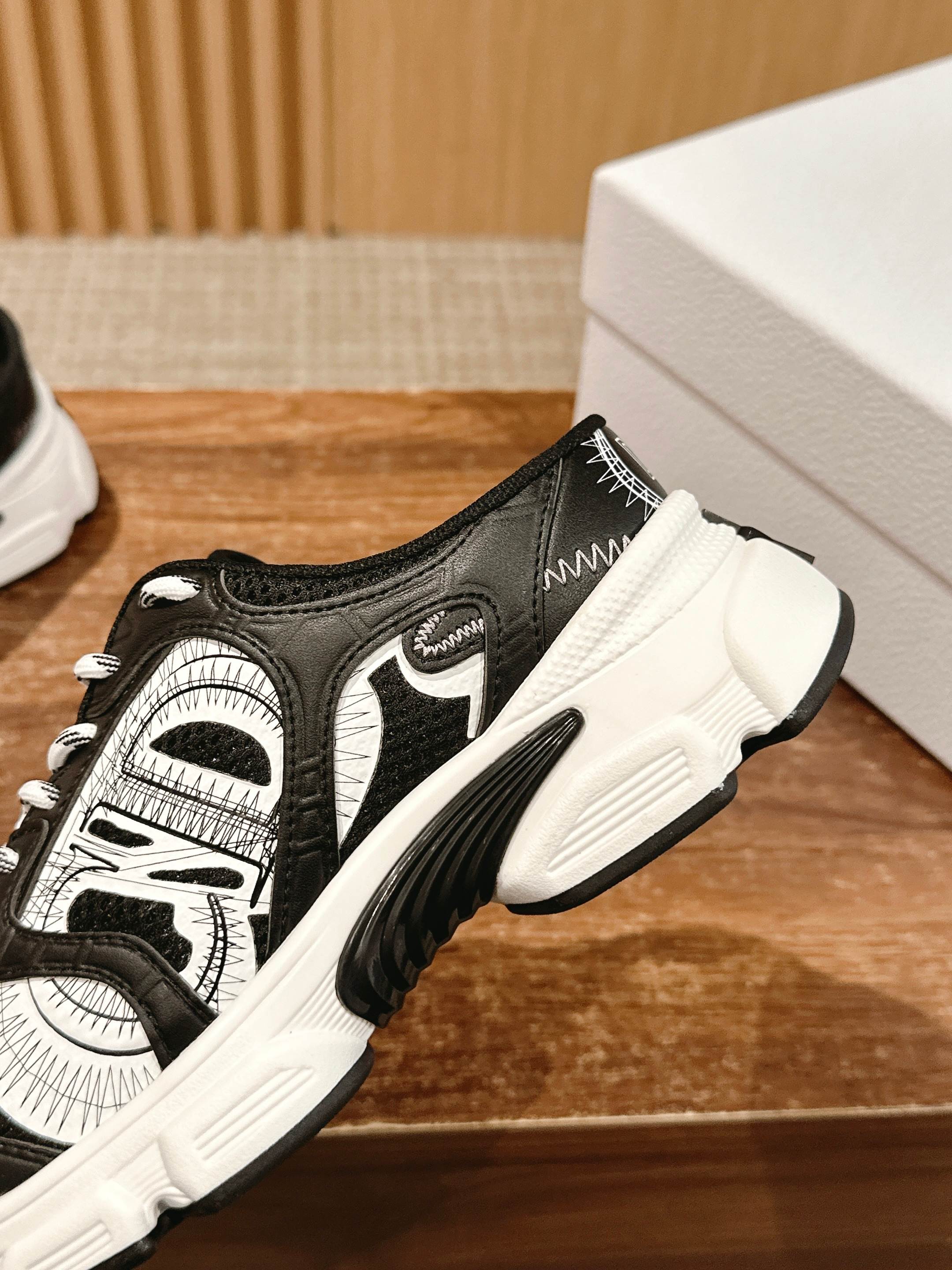 Dior lace-up sneakers, black and white slip-on style side panel with sole
