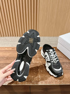 Dior lace-up sneakers with tread outsole view, black sole and black-white upper