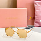 Gold-framed square sunglasses with light yellow-tinted lenses