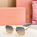 Gold-framed square sunglasses with amber-tinted lenses