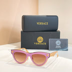 Versace sunglasses, light purple cat-eye frames with tinted lenses and gold logo temples