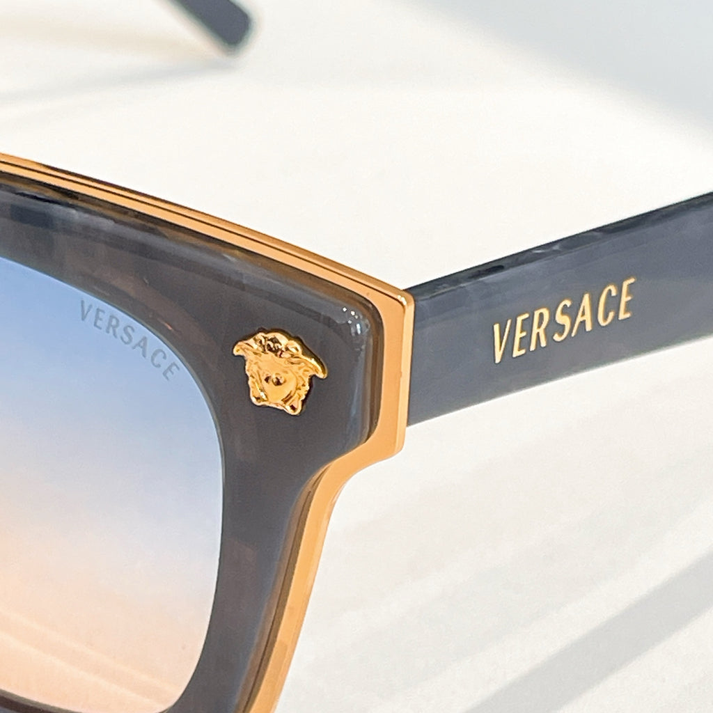 Tortoiseshell Versace sunglasses corner with gold logo on the temple