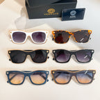 Set of six Versace sunglasses with assorted frames: white, blue, black, and tortoiseshell
