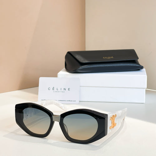Black cat-eye sunglasses with gold logo detail and dark lenses.