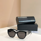 Black sunglasses with dark lenses and wide square frame with side "B" emblem